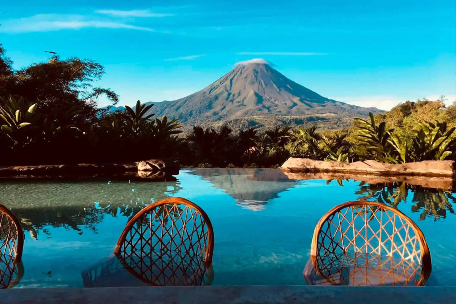 Infinity pool facing the volcano at The Springs Resort