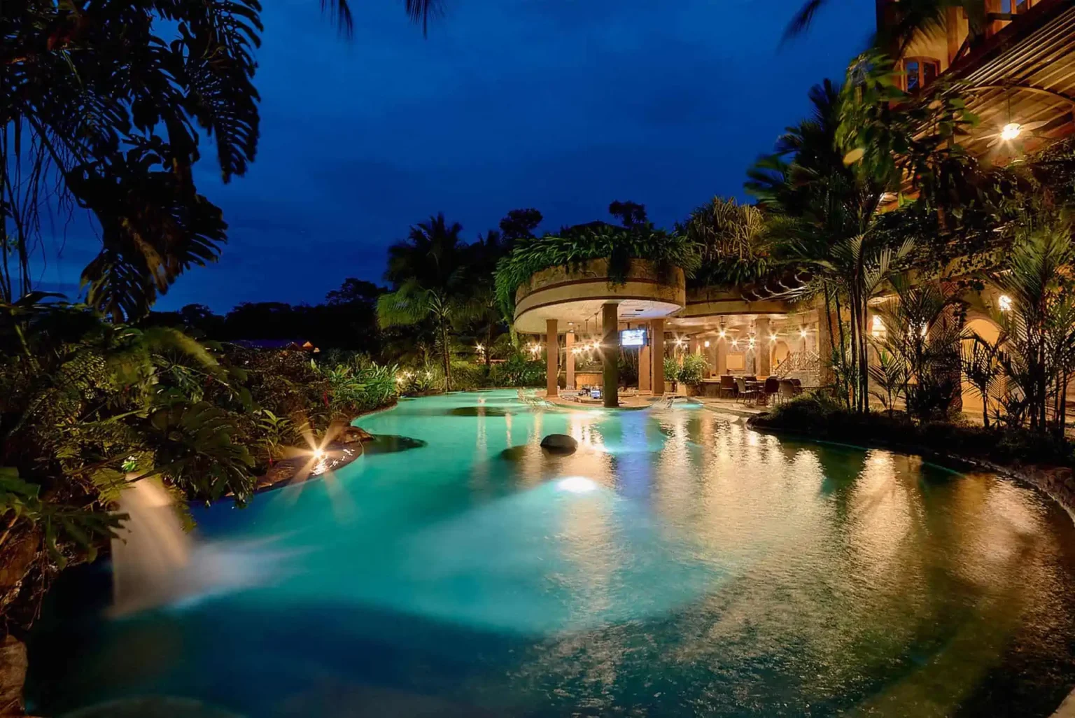 The pools after dark at The Springs Resort