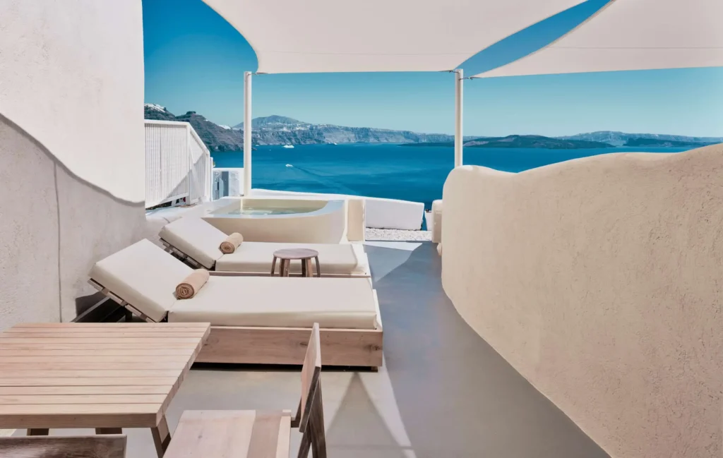 Couples at Mystique, a Luxury Collection Hotel, Santorini